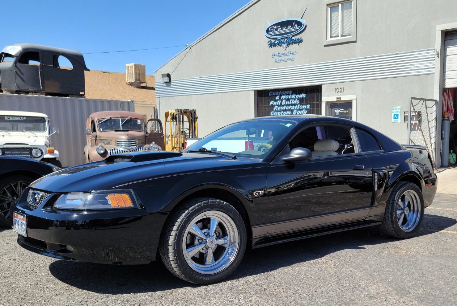 sleek black car outdoors