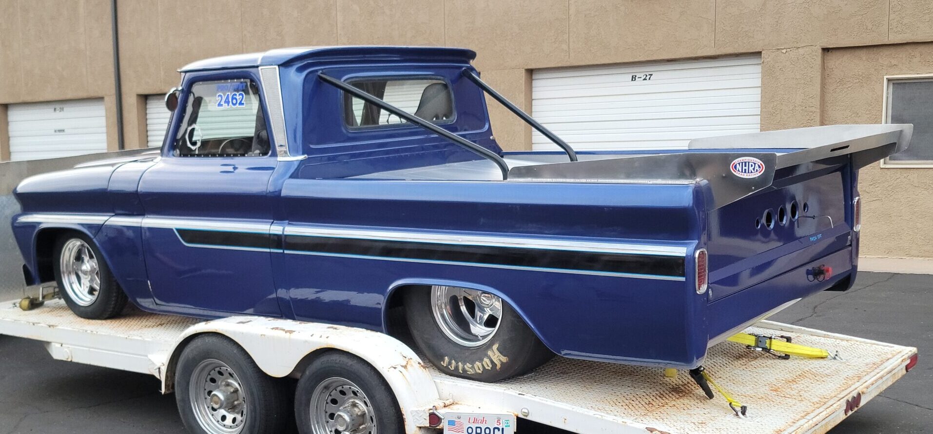 closeup dark blue pickup truck on platform